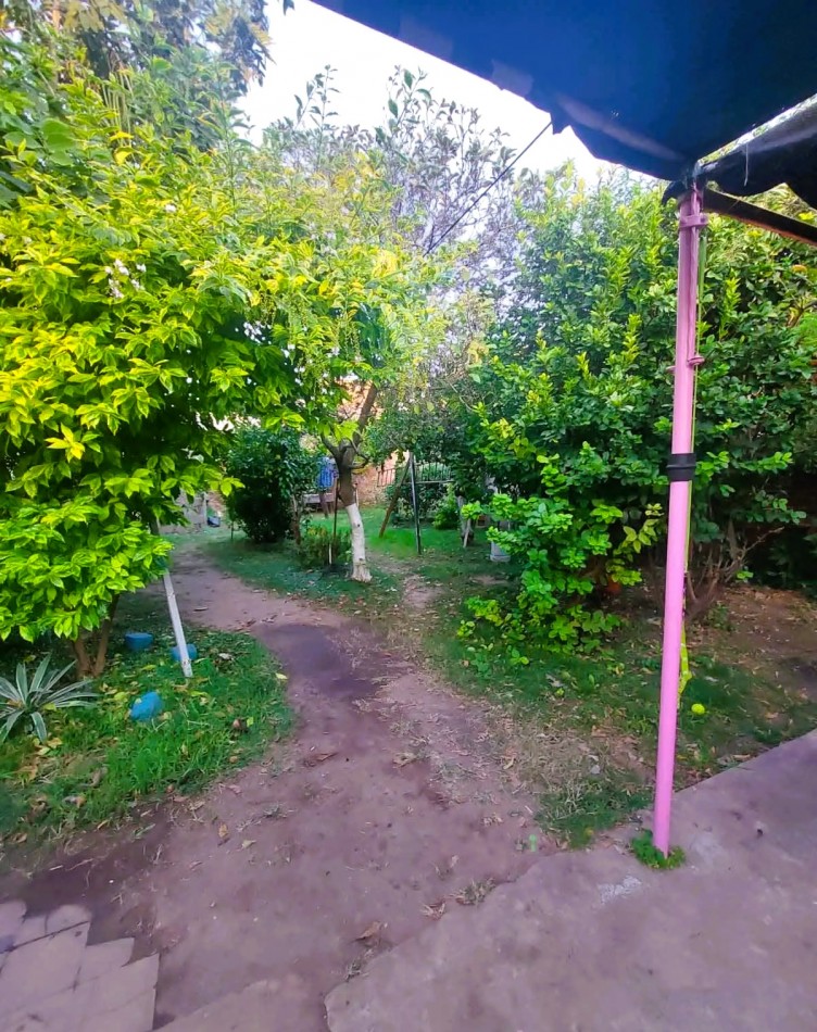 CASA INTERNA DE DOS DORMITORIOS Y PATIO VERDE